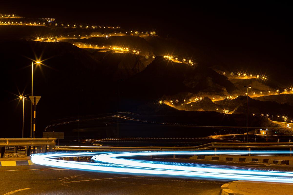 The lit mountain road up Jebel Hafeet in Al Ain at night