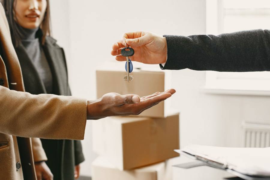 Keys being handed over in a new flat